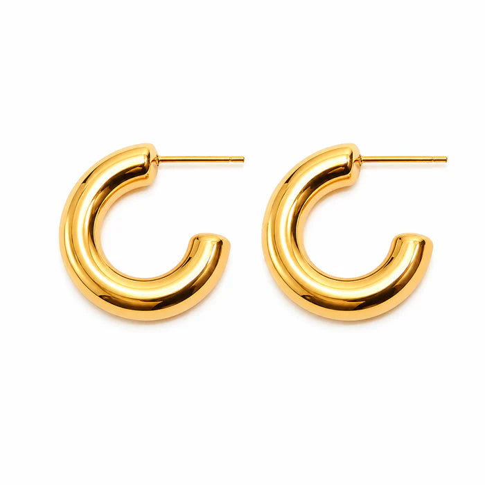 Minimal gold huggie earrings for daily wear