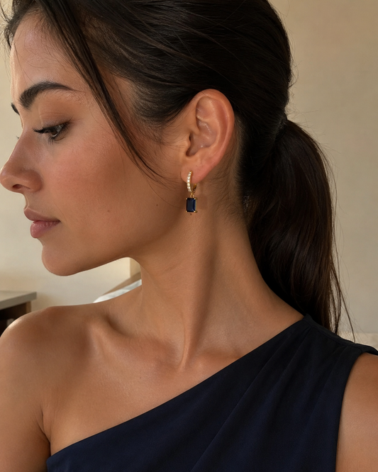Minimal gold huggie earrings for daily wear