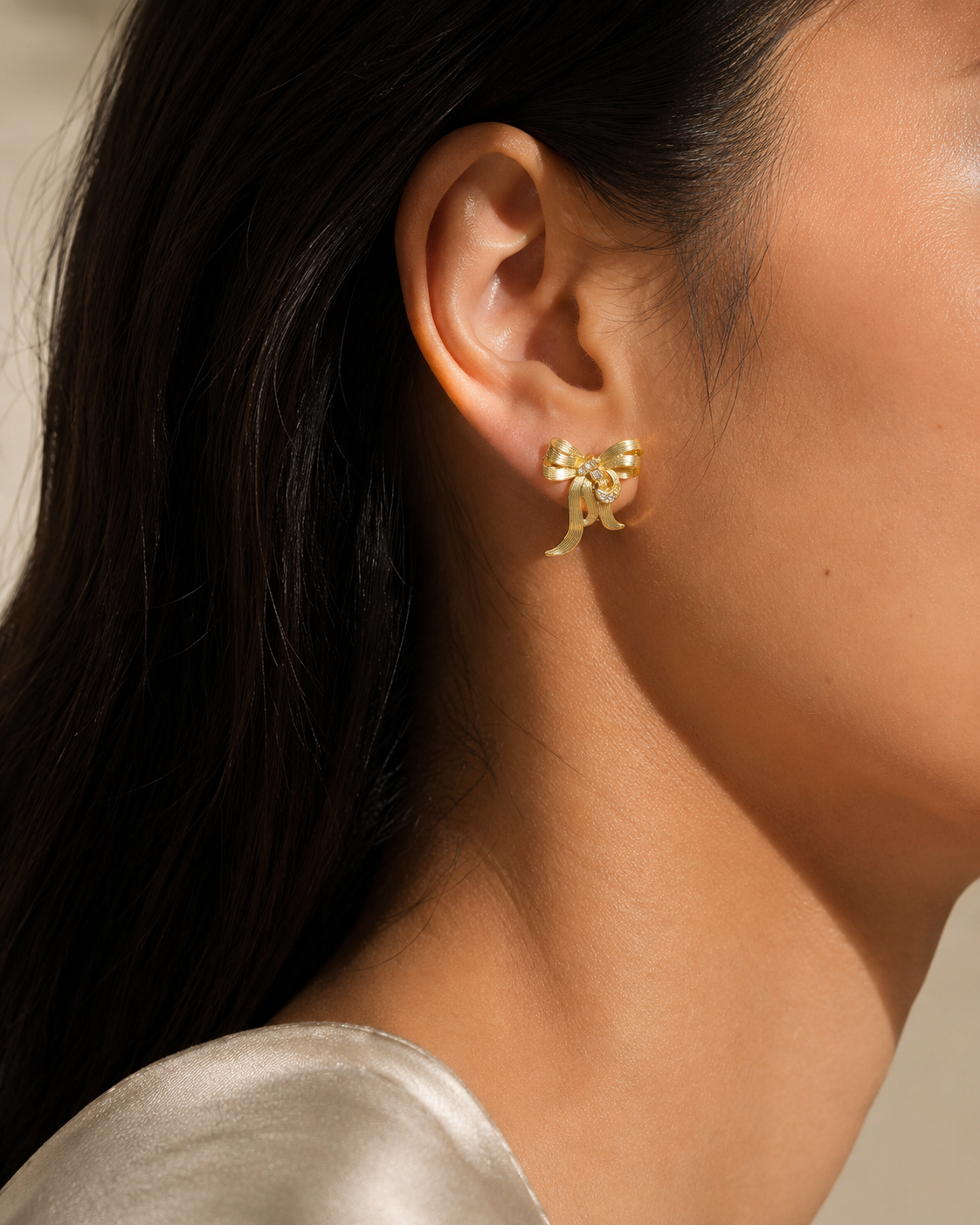 Minimal gold bow earrings for daily wear
