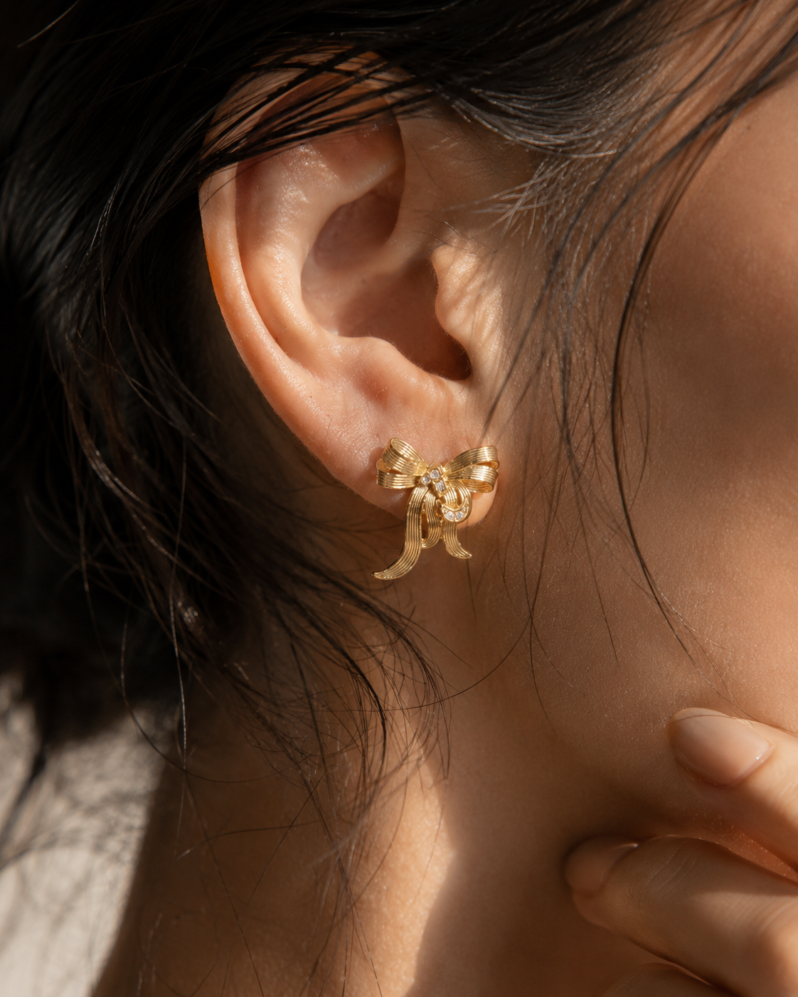 Minimal gold bow earrings for daily wear