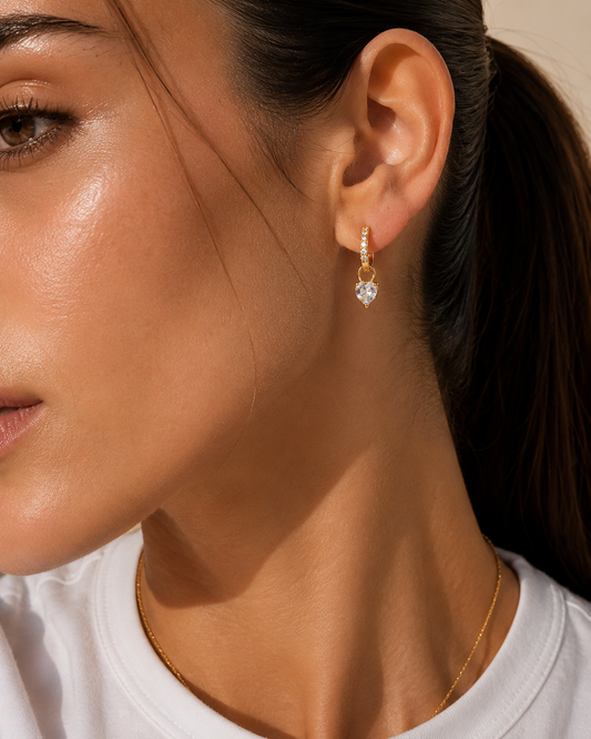 Minimal gold huggie earrings for daily wear